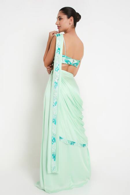 Shop Disha Kahai Green Satin, Silk, Net Sequins Scoop Embellished Pre-draped Saree With Blouse at Aza Fashions Shop_Disha Kahai_Green Satin, Silk, Net Sequins Scoop Embellished Pre-draped Saree With Blouse_at_Aza_Fashions