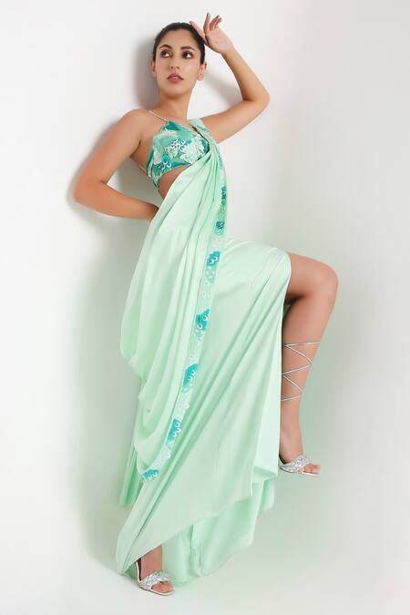 Disha Kahai Green Satin, Silk, Net Sequins Scoop Embellished Pre-draped Saree With Blouse at Aza Fashions Disha Kahai_Green Satin, Silk, Net Sequins Scoop Embellished Pre-draped Saree With Blouse_at_Aza_Fashions