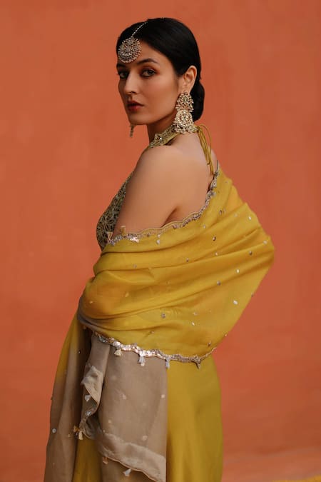 Shop Archana Jaju Yellow Satin, Silk Sequins Halter Neck Floral Cut-work Blouse Draped Skirt Set Online at Aza Fashions Shop_Archana Jaju_Yellow Satin, Silk Sequins Halter Neck Floral Cut-work Blouse Draped Skirt Set_Online_at_Aza_Fashions