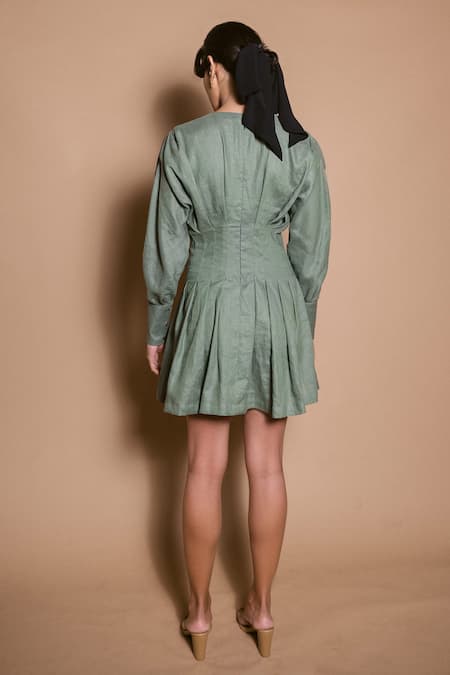 Shop Ojasmé By Sanjana Thapa Green Linen V-neck Greta Pleated Short Dress at Aza Fashions Shop_Ojasmé By Sanjana Thapa_Green Linen V-neck Greta Pleated Short Dress _at_Aza_Fashions