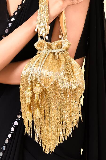 Buy House Of Webhin Gold Cut Work, Tassels Embellished Potli Buy_House Of Webhin_Gold Cut Work, Tassels Embellished Potli