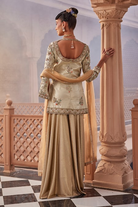 Shop Kaaisha By Shalini Gold Italian Lycra/ Silk Embroidered Beads Matka Botanic Kurta Sharara Set at Aza Fashions Shop_Kaaisha By Shalini_Gold Italian Lycra/ Silk Embroidered Beads Matka Botanic Kurta Sharara Set_at_Aza_Fashions