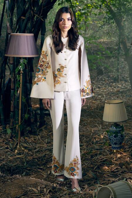 Shreeka Ivory Lycra Embroidery 3d Flower Cape Jacket And Pant Set Online at Aza Fashions Shreeka_Ivory Lycra Embroidery 3d Flower Cape Jacket And Pant Set _Online_at_Aza_Fashions