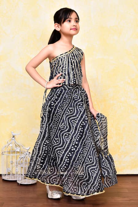 Petite Pomme_Black Cotton, Kota Doria Bandhani Print One Shoulder Blouse Lehenga Set _Online_at_Aza_Fashions