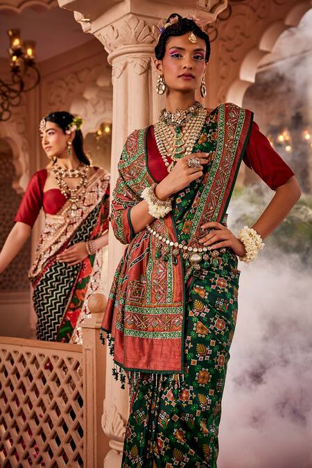 Kaaisha By Shalini Green Brocade, Silk Patola Print Banarasi Saree With Unstitched Blouse Piece at Aza Fashions Kaaisha By Shalini_Green Brocade, Silk Patola Print Banarasi Saree With Unstitched Blouse Piece_at_Aza_Fashions