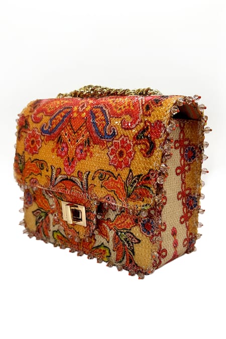 The Garnish Company Yellow Sequin Hellios Paisley Bloom Print Turn Lock Bag Online at Aza Fashions The Garnish Company_Yellow Sequin Hellios Paisley Bloom Print Turn Lock Bag _Online_at_Aza_Fashions