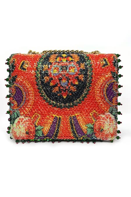 Shop The Garnish Company Purple Sequin Nanaka Paisley Fleur Print Turn Lock Bag at Aza Fashions Shop_The Garnish Company_Purple Sequin Nanaka Paisley Fleur Print Turn Lock Bag _at_Aza_Fashions