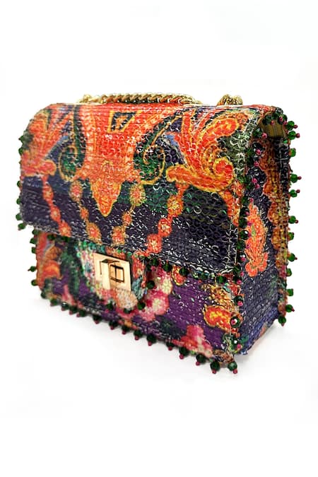 The Garnish Company Purple Sequin Nanaka Paisley Fleur Print Turn Lock Bag Online at Aza Fashions The Garnish Company_Purple Sequin Nanaka Paisley Fleur Print Turn Lock Bag _Online_at_Aza_Fashions