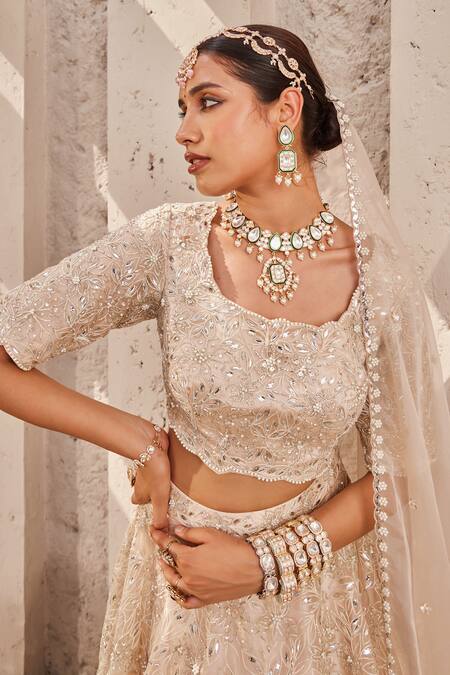Nidhika Shekhar_Cream Organza, Satin Maharani-e-khaas Floral Embroidered Bridal Lehenga Set _at_Aza_Fashions