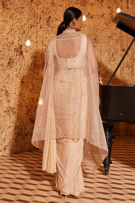 Shop NIDHIKA SHEKHAR Pink Silk, Organza, Subh Shree Utsav Textured Pre-draped Saree Cape Set at Aza Fashions Shop_NIDHIKA SHEKHAR_Pink Silk, Organza, Subh Shree Utsav Textured Pre-draped Saree Cape Set _at_Aza_Fashions