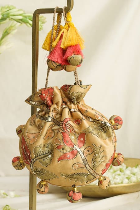 Shop Ozel Yellow Sequin Kalamkari Print Potli Bag at Aza Fashions Shop_Ozel_Yellow Sequin Kalamkari Print Potli Bag _at_Aza_Fashions