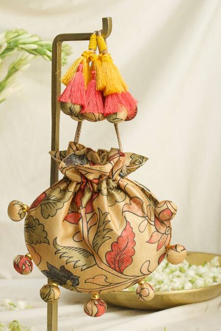 Ozel Yellow Sequin Kalamkari Print Potli Bag at Aza Fashions Ozel_Yellow Sequin Kalamkari Print Potli Bag _at_Aza_Fashions