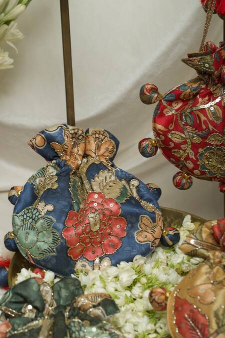 Ozel_Blue Sequin Floral Kalamkari Print Potli Bag _at_Aza_Fashions