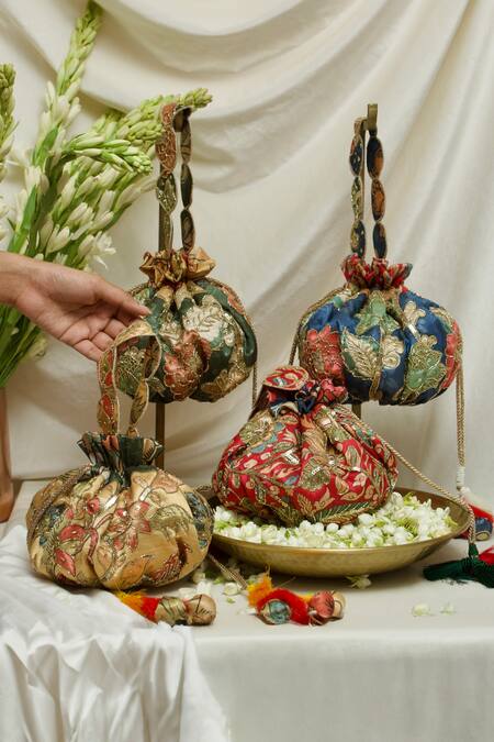 Ozel Yellow Sequin Kalamkari Embroidered And Printed Potli Bag Online at Aza Fashions Ozel_Yellow Sequin Kalamkari Embroidered And Printed Potli Bag _Online_at_Aza_Fashions