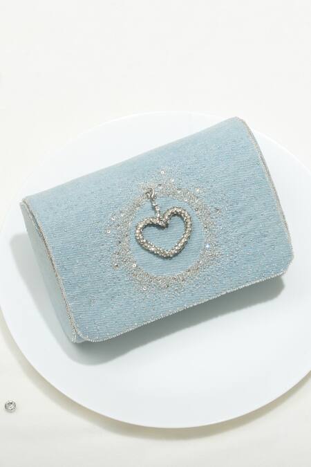 Ozel Blue Stone Denim Heart Embroidered Charm Clutch Online at Aza Fashions Ozel_Blue Stone Denim Heart Embroidered Charm Clutch _Online_at_Aza_Fashions