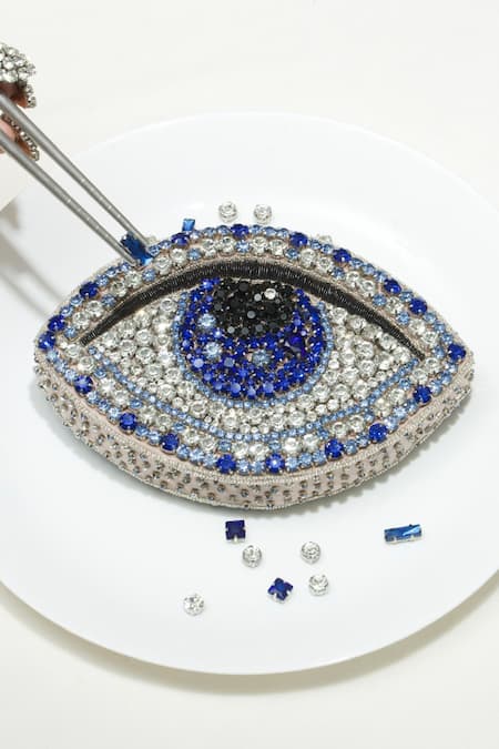 Ozel Blue Rhinestone Evil Eye Arm Candy Embellished Clutch Online at Aza Fashions Ozel_Blue Rhinestone Evil Eye Arm Candy Embellished Clutch _Online_at_Aza_Fashions