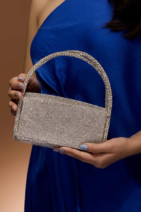 Shop Ozel Silver Rhinestones Hotfix Heart Embellished Flap Bag at Aza Fashions Shop_Ozel_Silver Rhinestones Hotfix Heart Embellished Flap Bag _at_Aza_Fashions