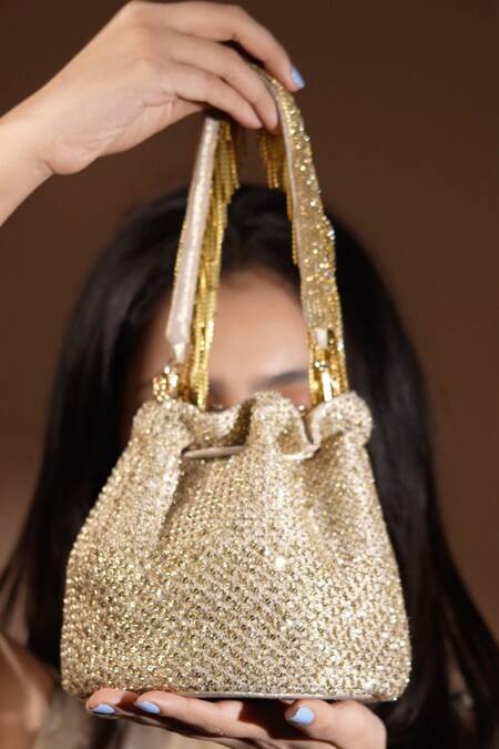 Buy Ozel Gold Sequins Pixel Potli Bucket Bag Online at Aza Fashions Buy_Ozel_Gold Sequins Pixel Potli Bucket Bag _Online_at_Aza_Fashions