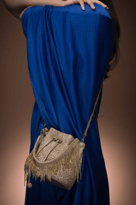 Buy Ozel Gold Sequins Pixel Potli Bucket Bag Buy_Ozel_Gold Sequins Pixel Potli Bucket Bag