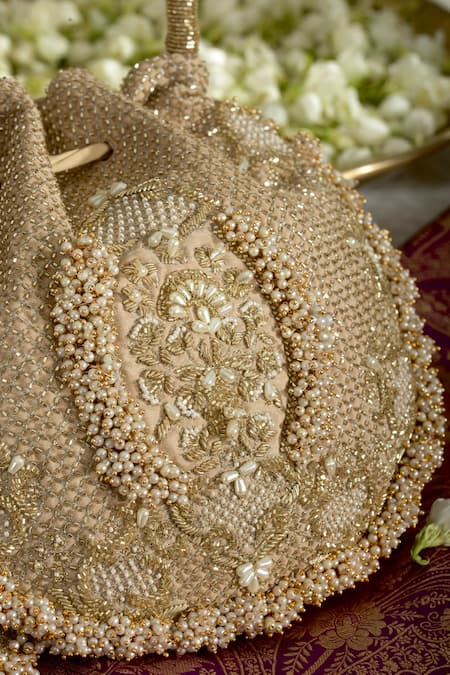 Buy_Ozel_Gold Cut Work, Pearls, Sequins Suhani Moti Meadow Embellished Potli Bag _Online_at_Aza_Fashions