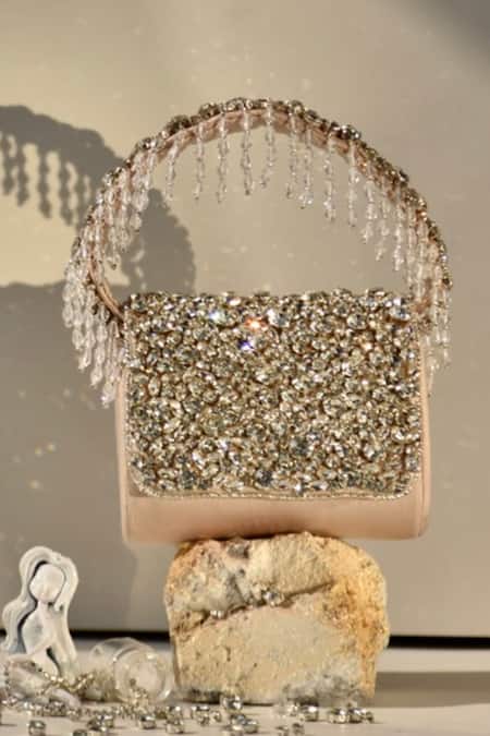 Shop Ozel Silver Rhinestones Petal Studded Mini Flap Bag at Aza Fashions Shop_Ozel_Silver Rhinestones Petal Studded Mini Flap Bag _at_Aza_Fashions