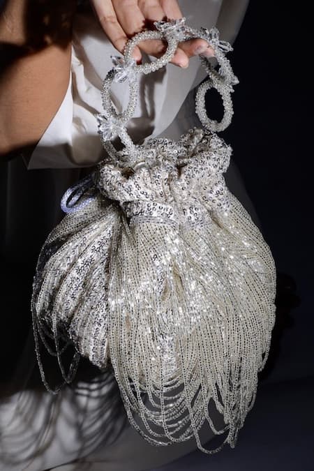 Shop Ozel Silver Sequins Dragon Nest Potli Bag at Aza Fashions Shop_Ozel_Silver Sequins Dragon Nest Potli Bag _at_Aza_Fashions