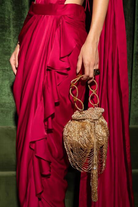 Ozel Gold Sequins Dragon Nest Encrusted Potli Bag at Aza Fashions Ozel_Gold Sequins Dragon Nest Encrusted Potli Bag _at_Aza_Fashions