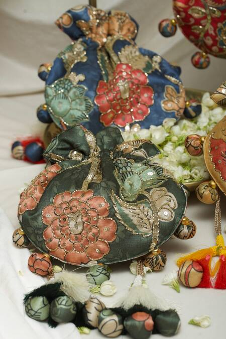 Ozel Green Kalamkari Print Bloom U Shaped Potli Bag at Aza Fashions Ozel_Green Kalamkari Print Bloom U Shaped Potli Bag _at_Aza_Fashions