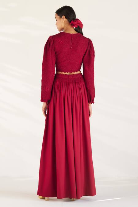 Shop Ilk Red Cotton Satin Plain Round Serein Smocked Top And Skirt Set at Aza Fashions Shop_Ilk_Red Cotton Satin Plain Round Serein Smocked Top And Skirt Set _at_Aza_Fashions