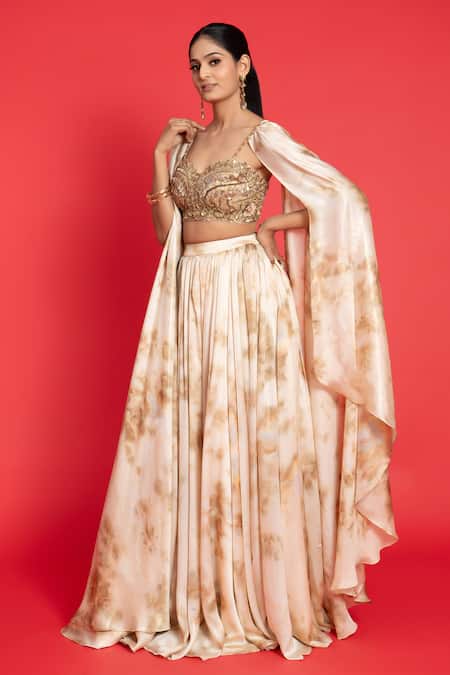 Aurouss_Gold Georgette Sequins, Cut Work Mug Dye Print Lehenga With Embroidered Blouse _at_Aza_Fashions