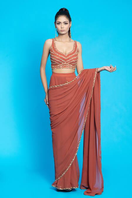 Shop_Aurouss_Orange Georgette Sequins, Cut Work Turtle Neck Pre-draped Saree With Blouse _Online_at_Aza_Fashions