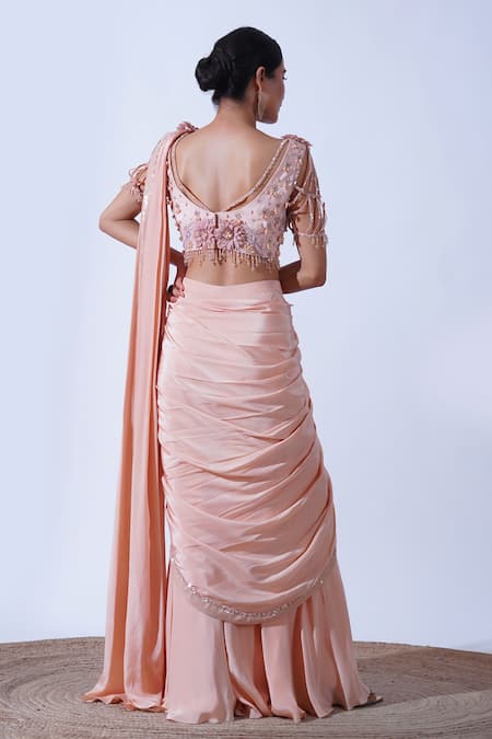 Shop Aurouss Peach Silk, Crepe Pearls, Sequins, Vedika Embellished Border Palazzo Saree Set at Aza Fashions Shop_Aurouss_Peach Silk, Crepe Pearls, Sequins, Vedika Embellished Border Palazzo Saree Set _at_Aza_Fashions