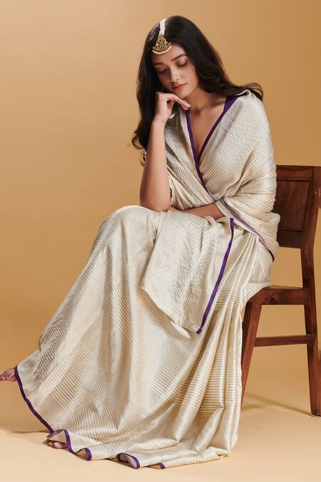 Buy_Surmaye_Ivory Silk Satin Stripe Pattern Handwoven Rippled Saree _Online_at_Aza_Fashions