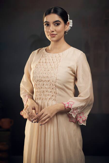 Hirika & Dhruti Beige Chanderi Embroidery Round Neck Smocked Gathered Kurta And Pant Set Online at Aza Fashions Hirika & Dhruti_Beige Chanderi Embroidery Round Neck Smocked Gathered Kurta And Pant Set _Online_at_Aza_Fashions