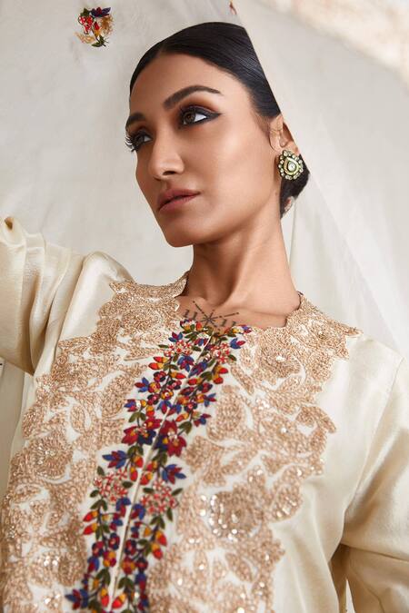 Shop Prisho Ivory Silk, Organza Diamonds, Pearls, Embroidery, Dori Kurta Dhoti Skirt Set at Aza Fashions Shop_Prisho_Ivory Silk, Organza Diamonds, Pearls, Embroidery, Dori Kurta Dhoti Skirt Set _at_Aza_Fashions