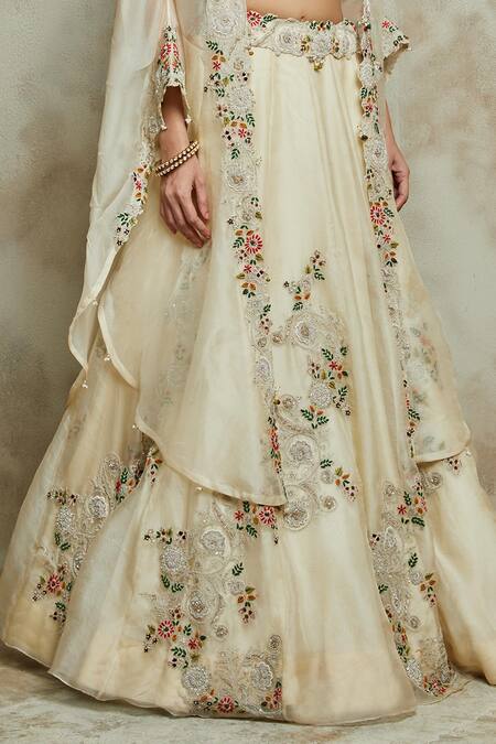 Prisho Ivory Silk, Organza Pearls, Zardozi Floral Vine Embroidered Cape Lehenga Set Online at Aza Fashions Prisho_Ivory Silk, Organza Pearls, Zardozi Floral Vine Embroidered Cape Lehenga Set _Online_at_Aza_Fashions