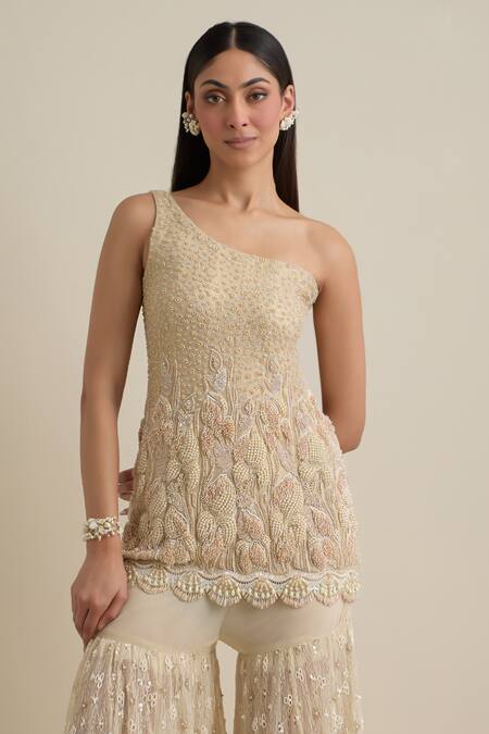 Buy Eeksha Beige Lace, Lycra, Net Pearls, Sequins One Shoulder Embroidered Cape Sharara Set Online at Aza Fashions Buy_Eeksha_Beige Lace, Lycra, Net Pearls, Sequins One Shoulder Embroidered Cape Sharara Set _Online_at_Aza_Fashions