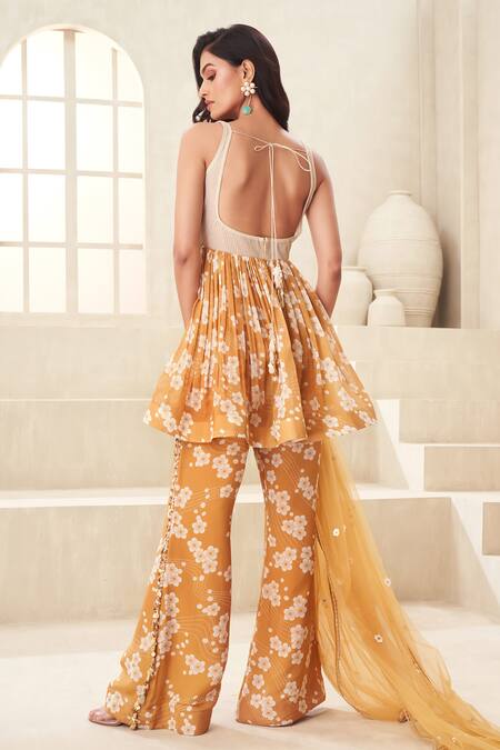 Shop_Taavare_Gold Organza, Tulle Embroidery Square Floral Print Peplum Top Flared Pant Set_at_Aza_Fashions