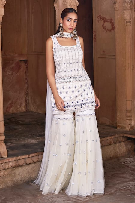 Diyarajvvir White Tulle, Satin, Lycra Sequins, Floral Bloom Embroidered Kurta Gharara Set Online at Aza Fashions Diyarajvvir_White Tulle, Satin, Lycra Sequins, Floral Bloom Embroidered Kurta Gharara Set _Online_at_Aza_Fashions