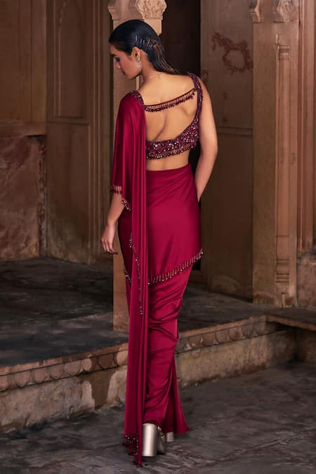 Shop Diyarajvvir Red Satin, Tulle Beads, Sequins Pre-draped Skirt Saree With Embroidered Blouse at Aza Fashions Shop_Diyarajvvir_Red Satin, Tulle Beads, Sequins Pre-draped Skirt Saree With Embroidered Blouse _at_Aza_Fashions