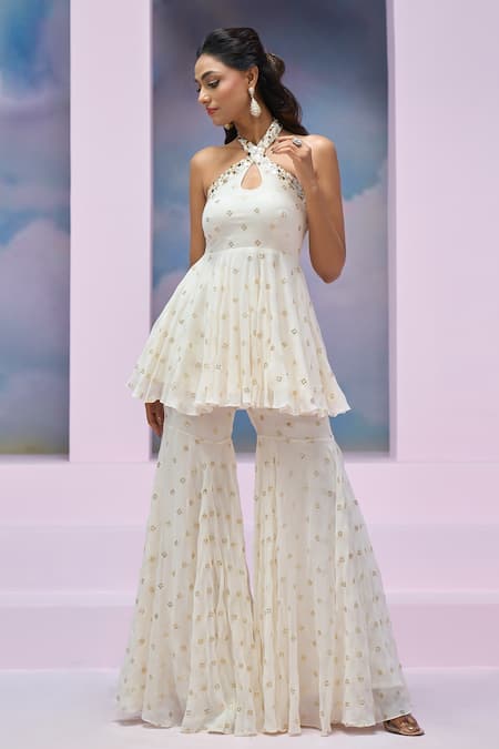 Buy Silky Bindra X AZA Ivory Georgette Sequins Keyhole Neck Lana Cross Peplum Kurta And Gharara Set Online at Aza Fashions Buy_Silky Bindra X AZA_Ivory Georgette Sequins Keyhole Neck Lana Cross Peplum Kurta And Gharara Set _Online_at_Aza_Fashions