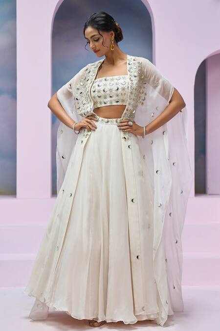 Shop Silky Bindra X AZA Ivory Organza, Silk Embroidery, Mirrors Square Neck Chaandni Cape Lehenga Set Online at Aza Fashions Shop_Silky Bindra X AZA_Ivory Organza, Silk Embroidery, Mirrors Square Neck Chaandni Cape Lehenga Set _Online_at_Aza_Fashions