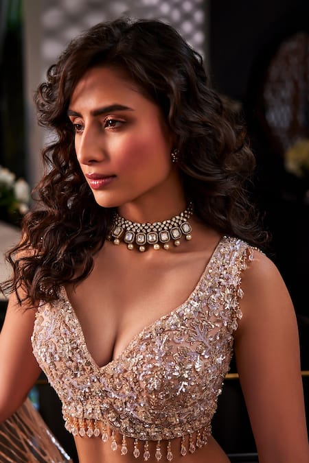 Shop Kalighata Peach Organza Stones, Tassels Plunge Sparkle Floral Hand Embroidered Lehenga Set at Aza Fashions Shop_Kalighata_Peach Organza Stones, Tassels Plunge Sparkle Floral Hand Embroidered Lehenga Set _at_Aza_Fashions