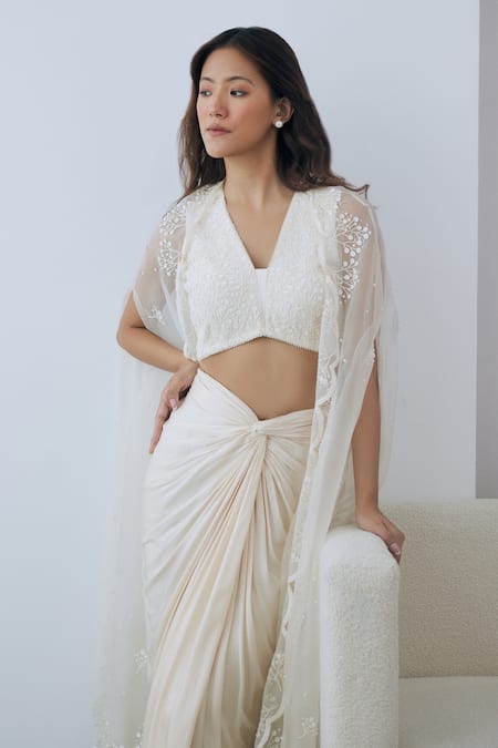 Lavanya Ahuja Ivory Crepe, Satin Sequins, Beads V-neck Embroidered Blouse And Skirt Set at Aza Fashions Lavanya Ahuja_Ivory Crepe, Satin Sequins, Beads V-neck Embroidered Blouse And Skirt Set _at_Aza_Fashions