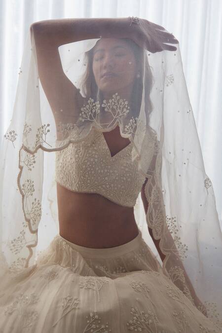 Lavanya Ahuja Ivory Crepe, Organza Sequins, Beads V-neck Hand Embroidered Blouse Lehenga Set Online at Aza Fashions Lavanya Ahuja_Ivory Crepe, Organza Sequins, Beads V-neck Hand Embroidered Blouse Lehenga Set _Online_at_Aza_Fashions