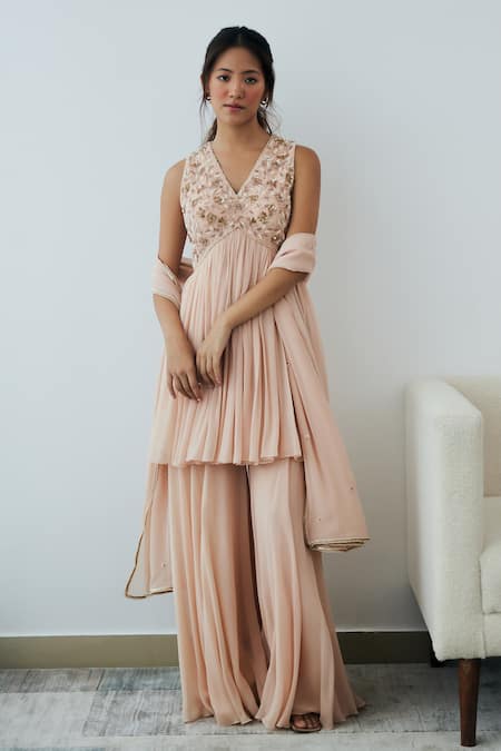 Shop Lavanya Ahuja Pink Georgette Pearls, Sequins, Beads V-neck Yoke Embroidered Kurta Sharara Set at Aza Fashions Shop_Lavanya Ahuja_Pink Georgette Pearls, Sequins, Beads V-neck Yoke Embroidered Kurta Sharara Set _at_Aza_Fashions