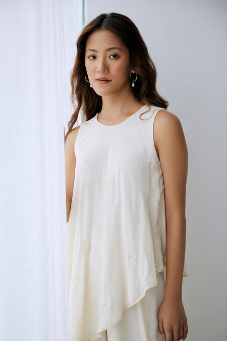 Shop Lavanya Ahuja Ivory Crepe Sequins, Beads Round Neck Embroidered Asymmetrical Tunic And Pant Set Online at Aza Fashions Shop_Lavanya Ahuja_Ivory Crepe Sequins, Beads Round Neck Embroidered Asymmetrical Tunic And Pant Set _Online_at_Aza_Fashions