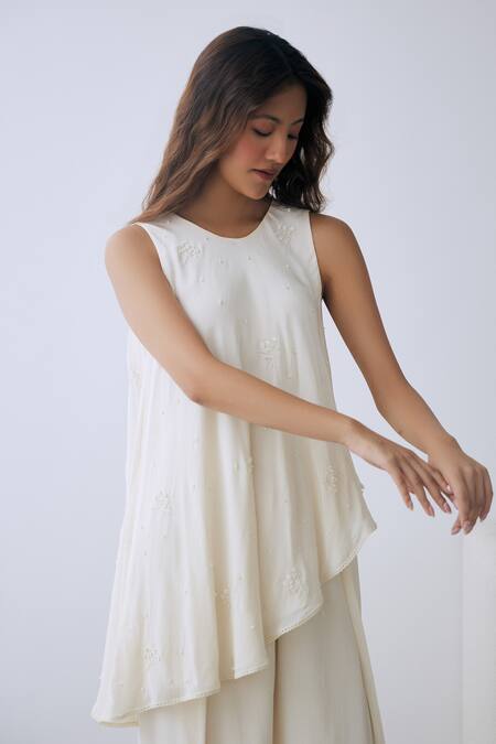 Lavanya Ahuja Ivory Crepe Sequins, Beads Round Neck Embroidered Asymmetrical Tunic And Pant Set at Aza Fashions Lavanya Ahuja_Ivory Crepe Sequins, Beads Round Neck Embroidered Asymmetrical Tunic And Pant Set _at_Aza_Fashions