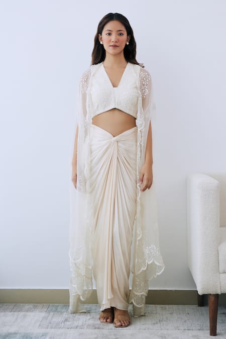 Shop Lavanya Ahuja Ivory Crepe, Satin Sequins, Beads V-neck Embroidered Blouse And Skirt Set at Aza Fashions Shop_Lavanya Ahuja_Ivory Crepe, Satin Sequins, Beads V-neck Embroidered Blouse And Skirt Set _at_Aza_Fashions