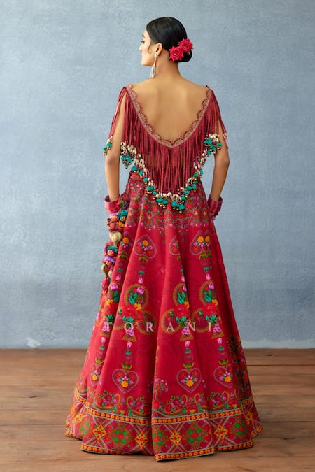 Shop_Torani_Red Jersey, Silk Fringe, Tassels, Pom-poms Blouse And Floral Print Lehenga Set _at_Aza_Fashions